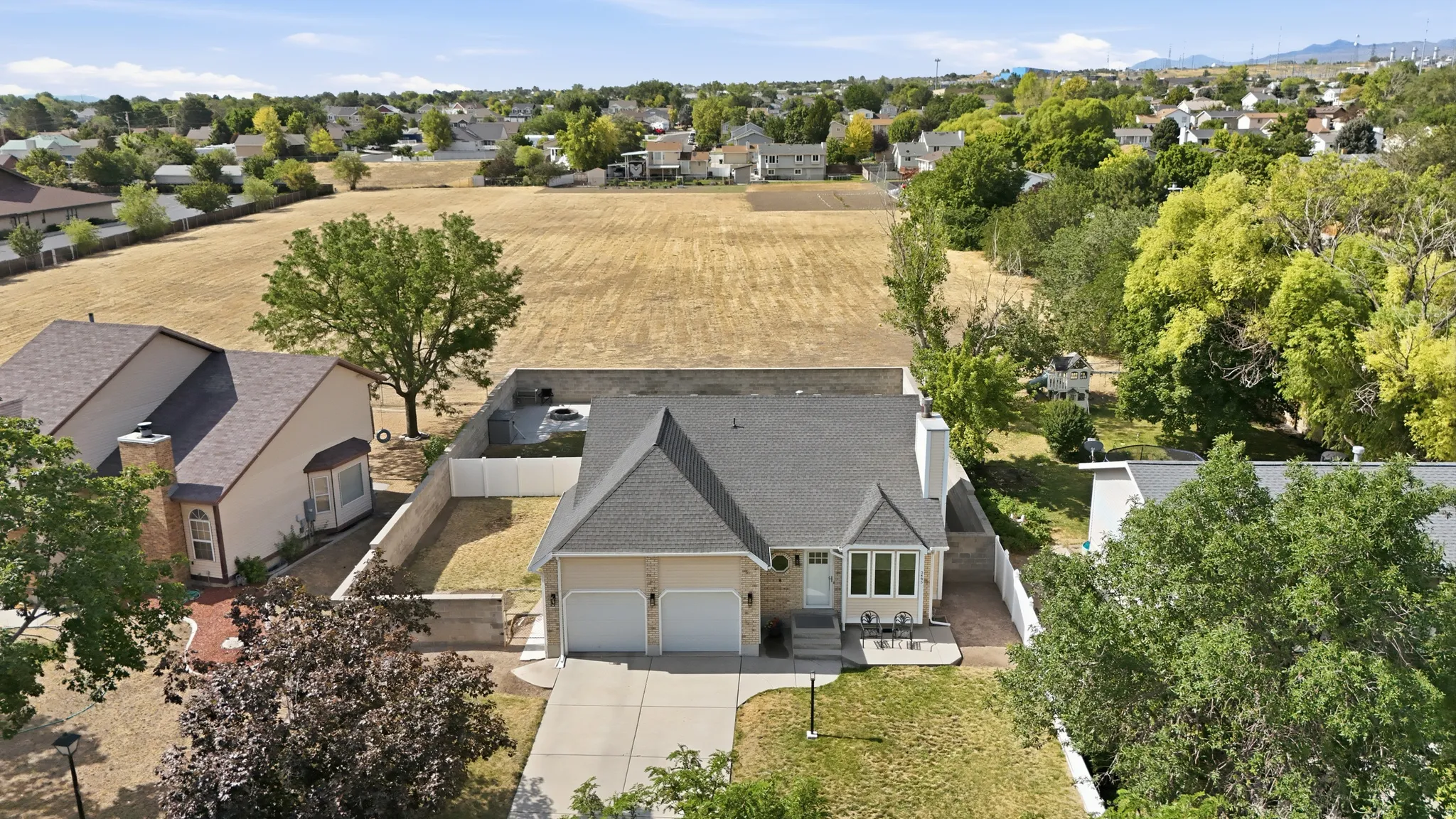 Single-story residence featuring an attached two-car garage with a paved driveway