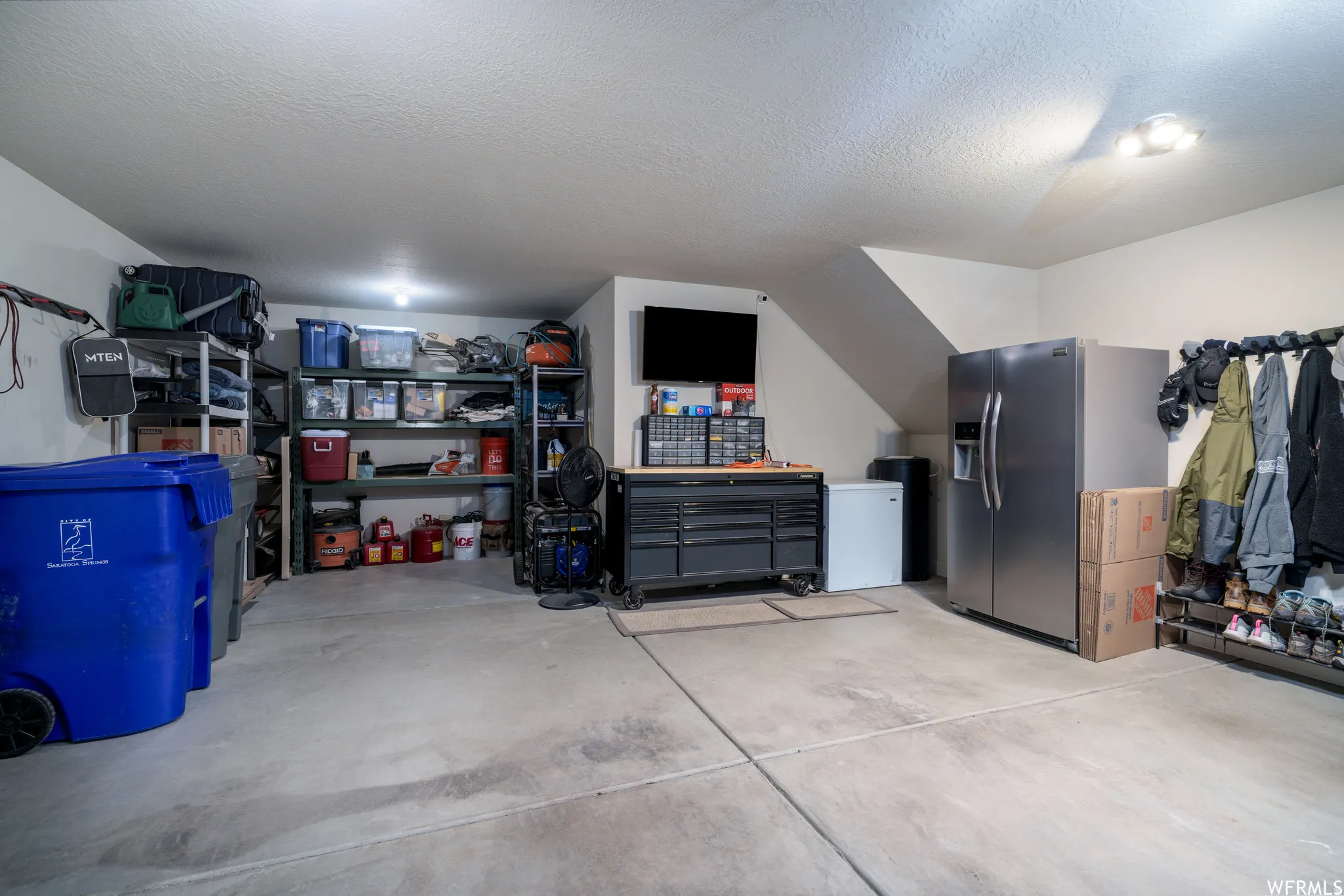Concrete flooring with integrated storage shelving