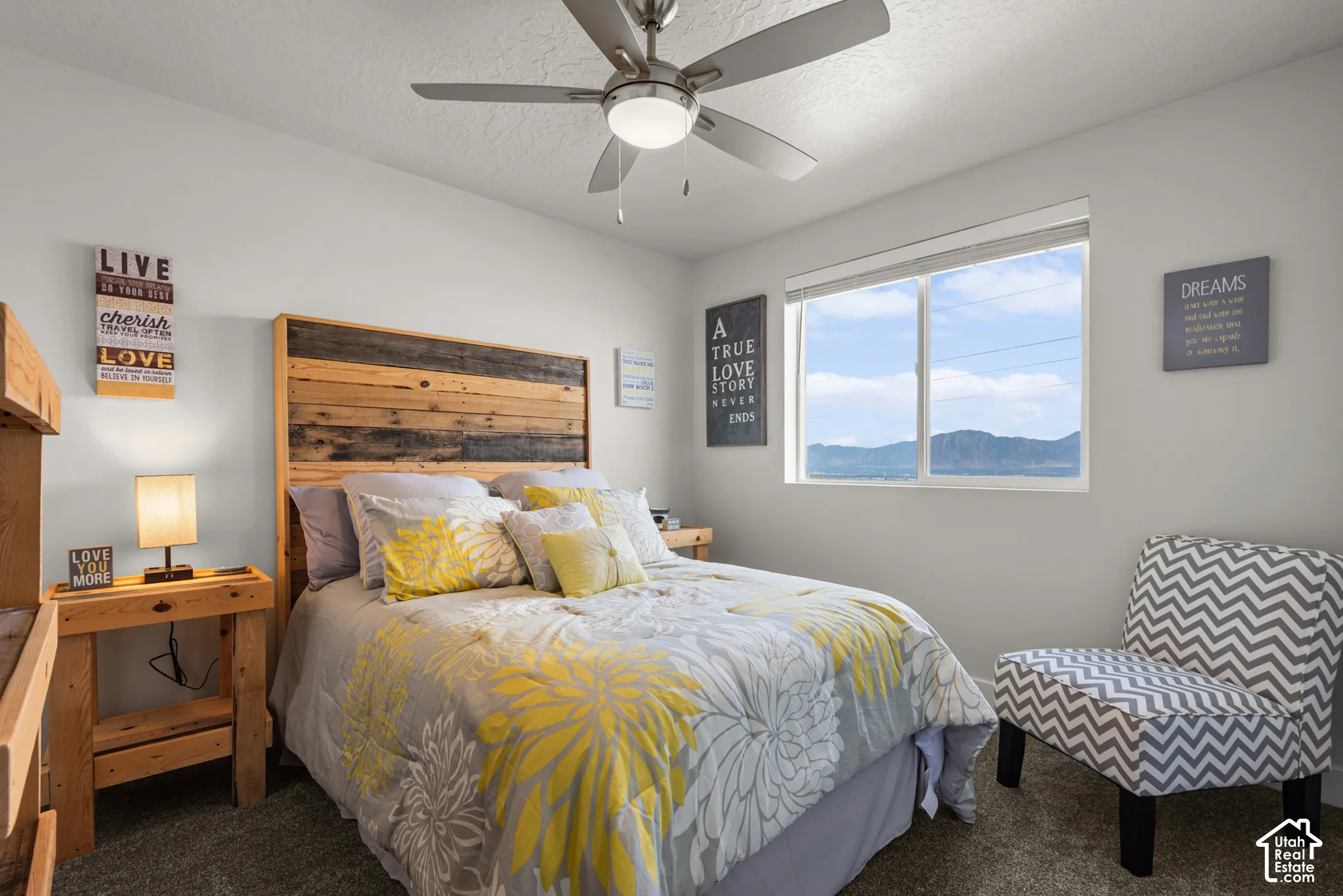 Room with light gray walls and carpeted flooring