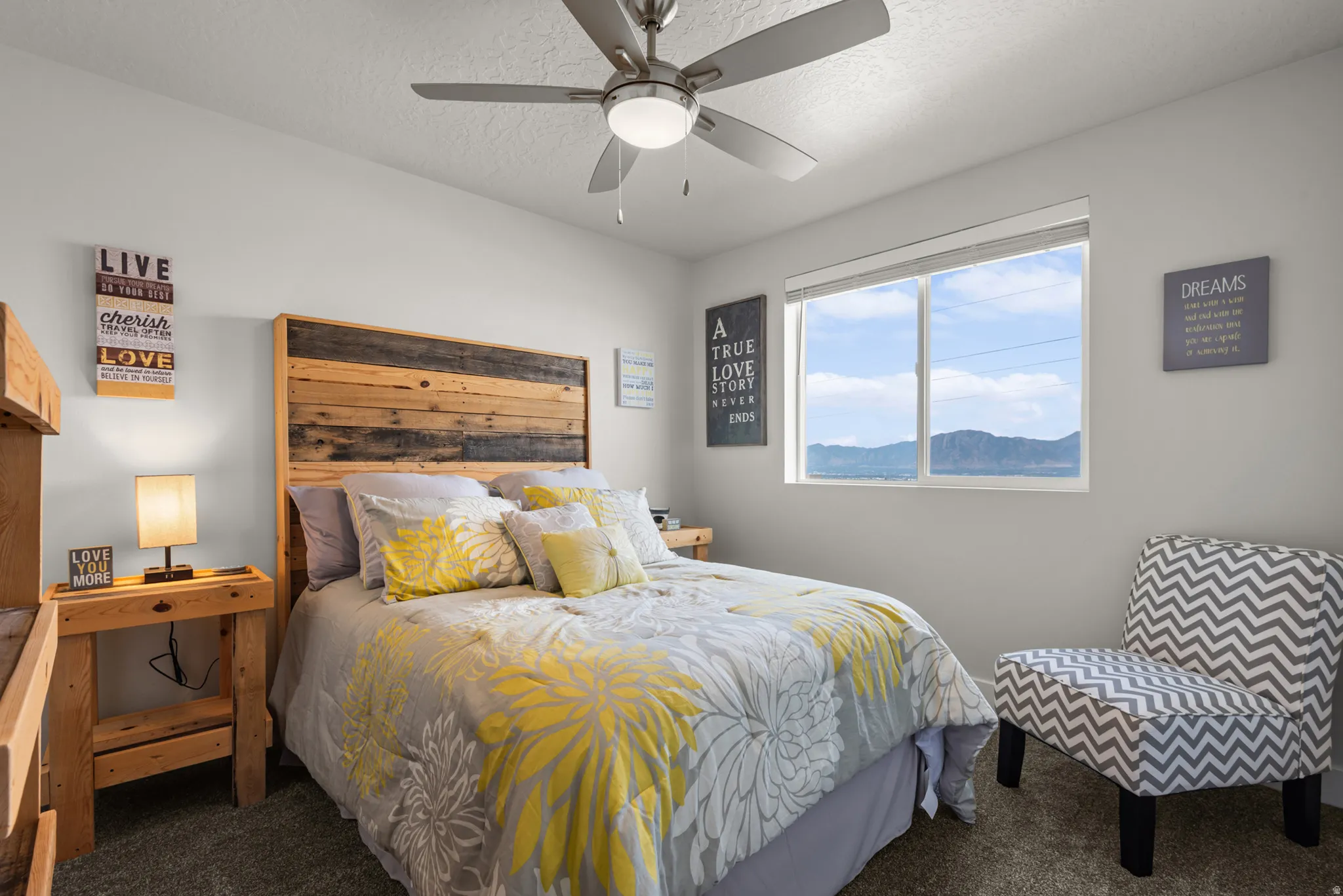 Room with light gray walls and carpeted flooring