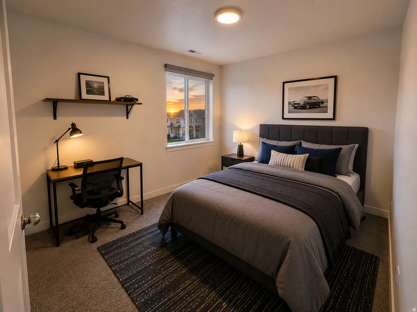 Carpeted bedroom featuring a large window, built-in wall shelf, and flush-mount ceiling light