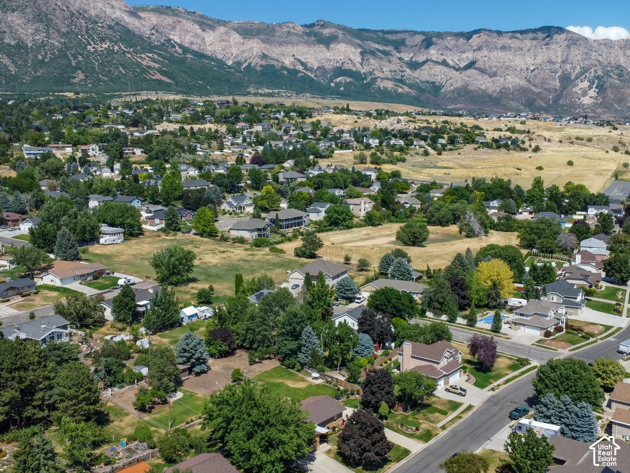 Expansive aerial capture showcasing a residential area with varied housing styles