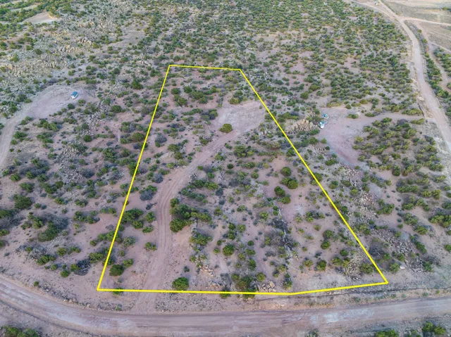 Expansive desert lot featuring varied topography and natural vegetation