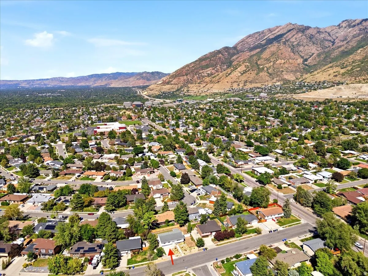 Residential area with multiple parks nearby, mature trees and a glorious mountain backdrop