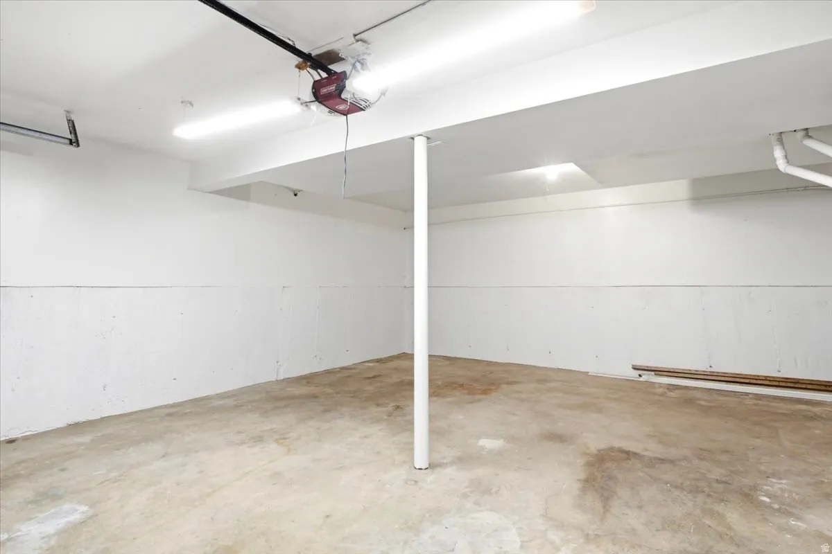 2 car garage, Electric car charger, finished white painted walls, garage door opener