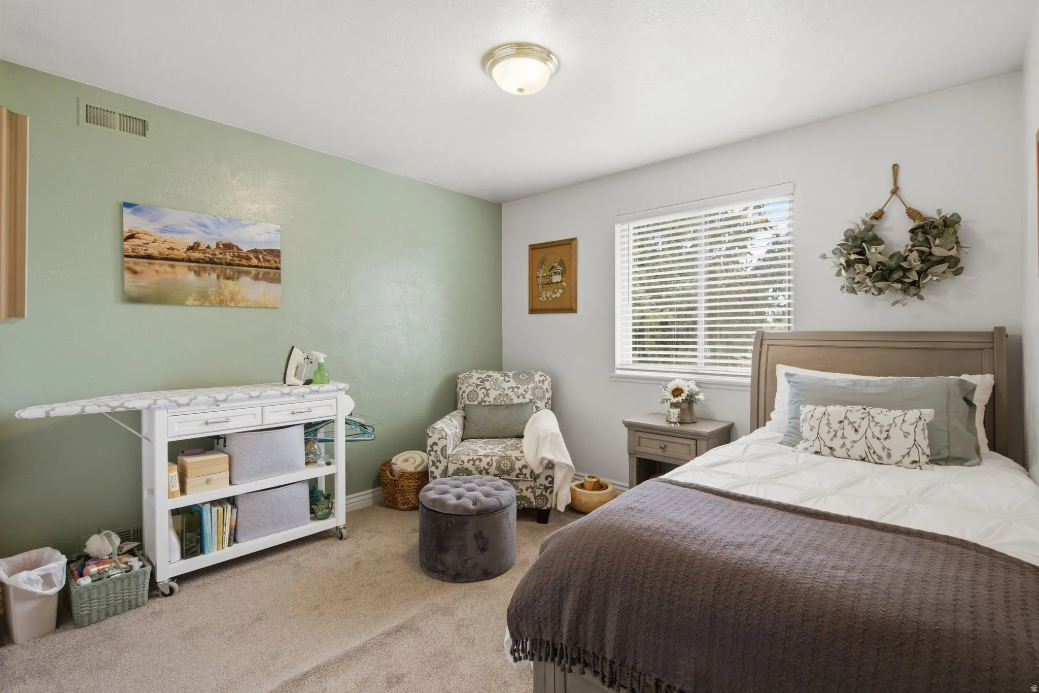 Room featuring neutral carpet flooring and a recessed window with blinds