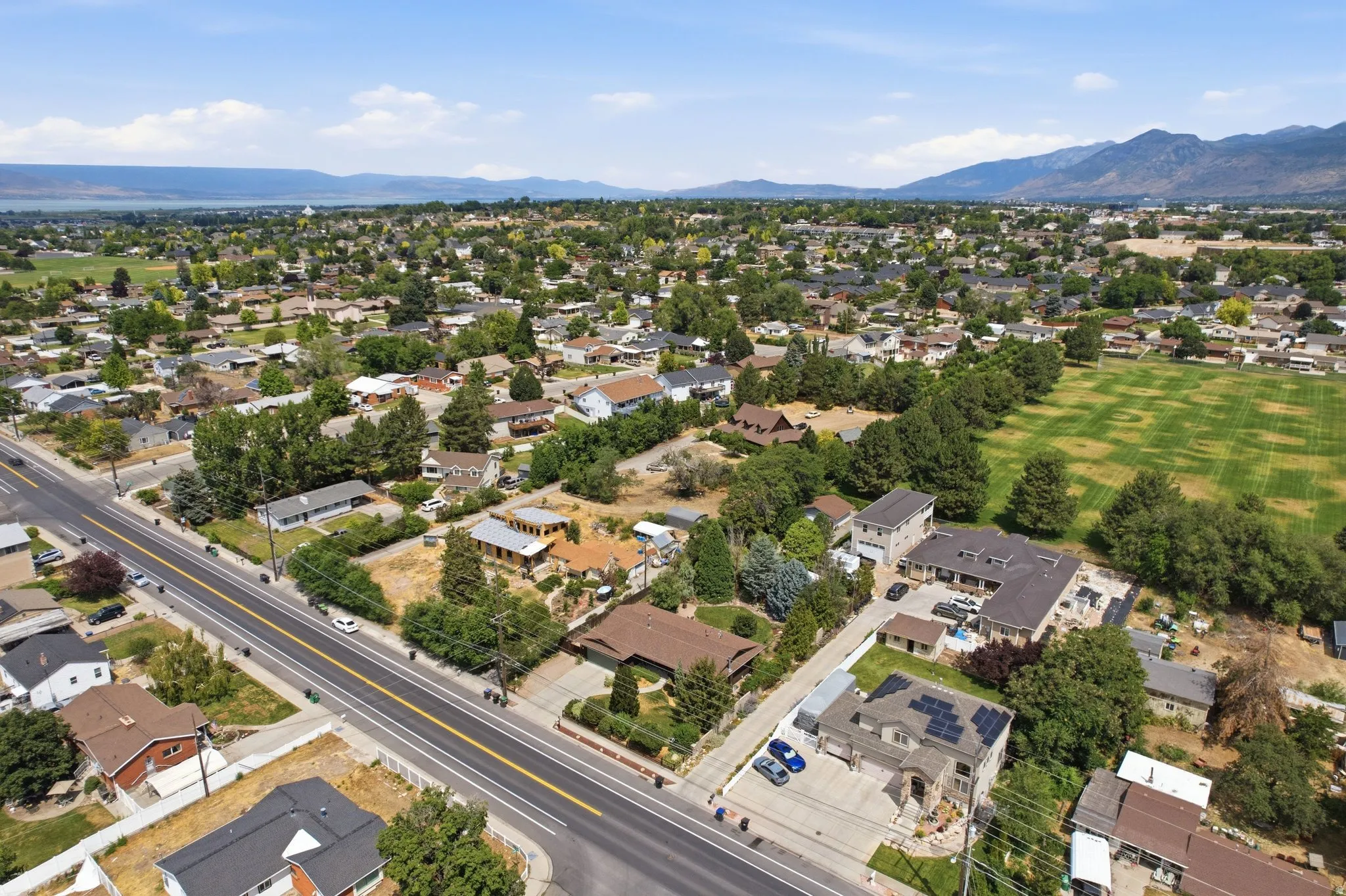 Aerial perspective showcasing a residential area with varied housing styles