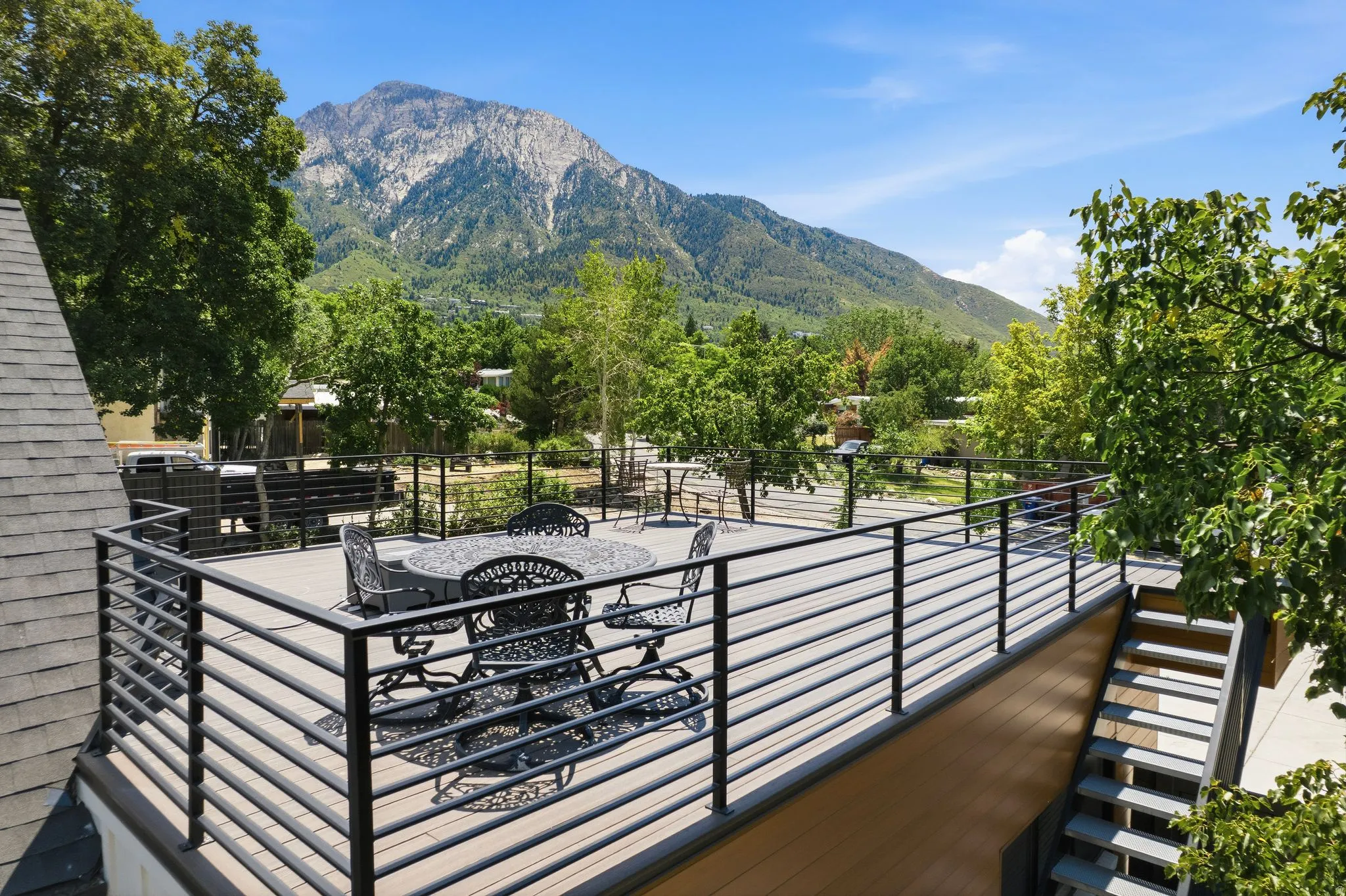 Elevated deck over the garage offering a grand view to Mt Olympus.