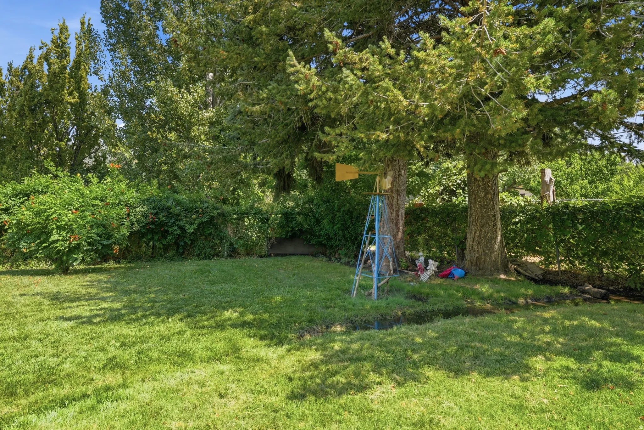Expansive green lawn providing ample outdoor space