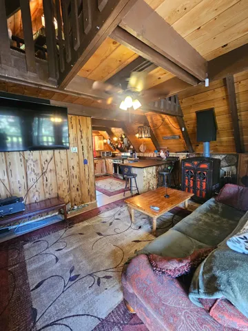 Living Room with beautiful wood burning stove!