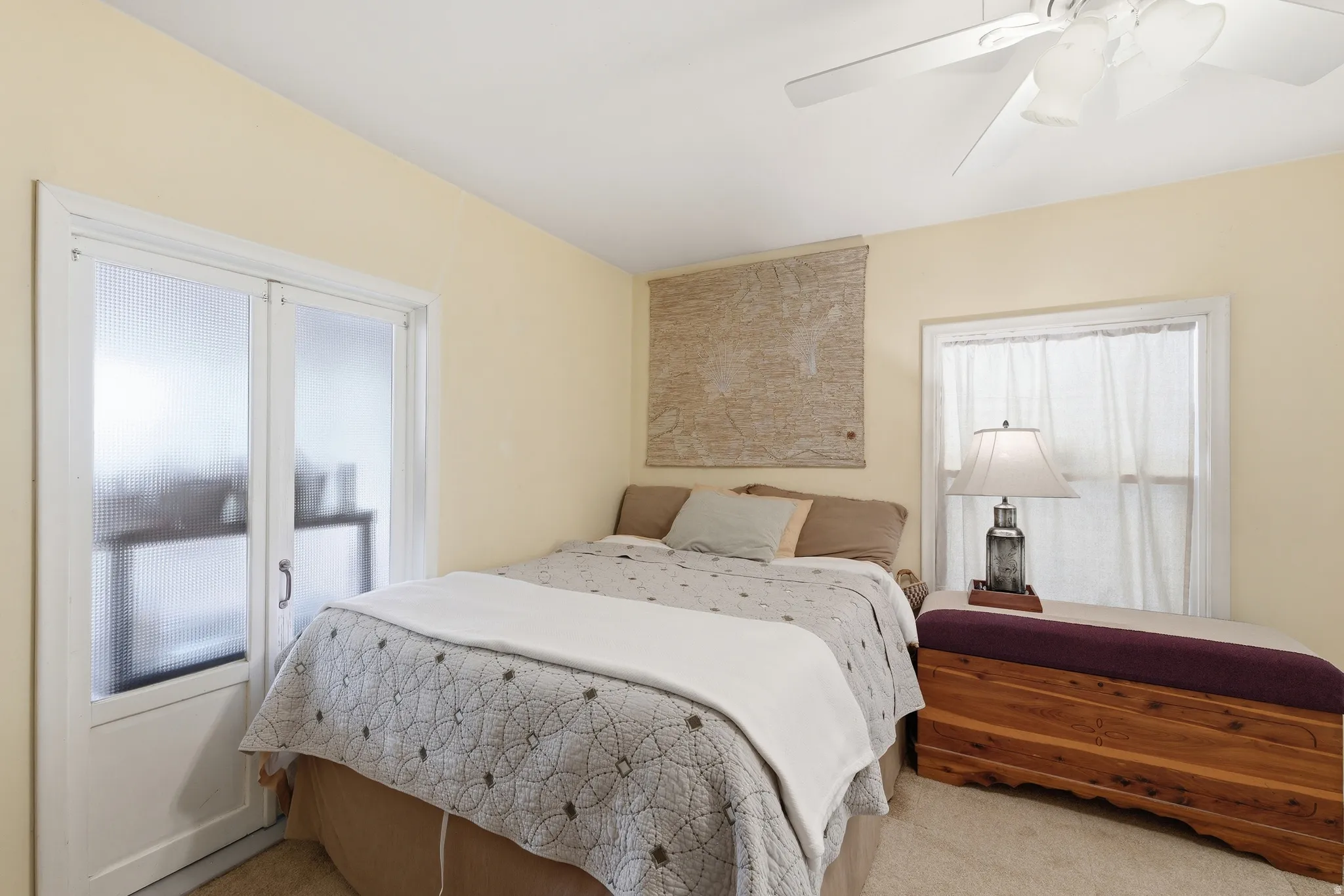 Recessed lighting and ceiling fan overhead