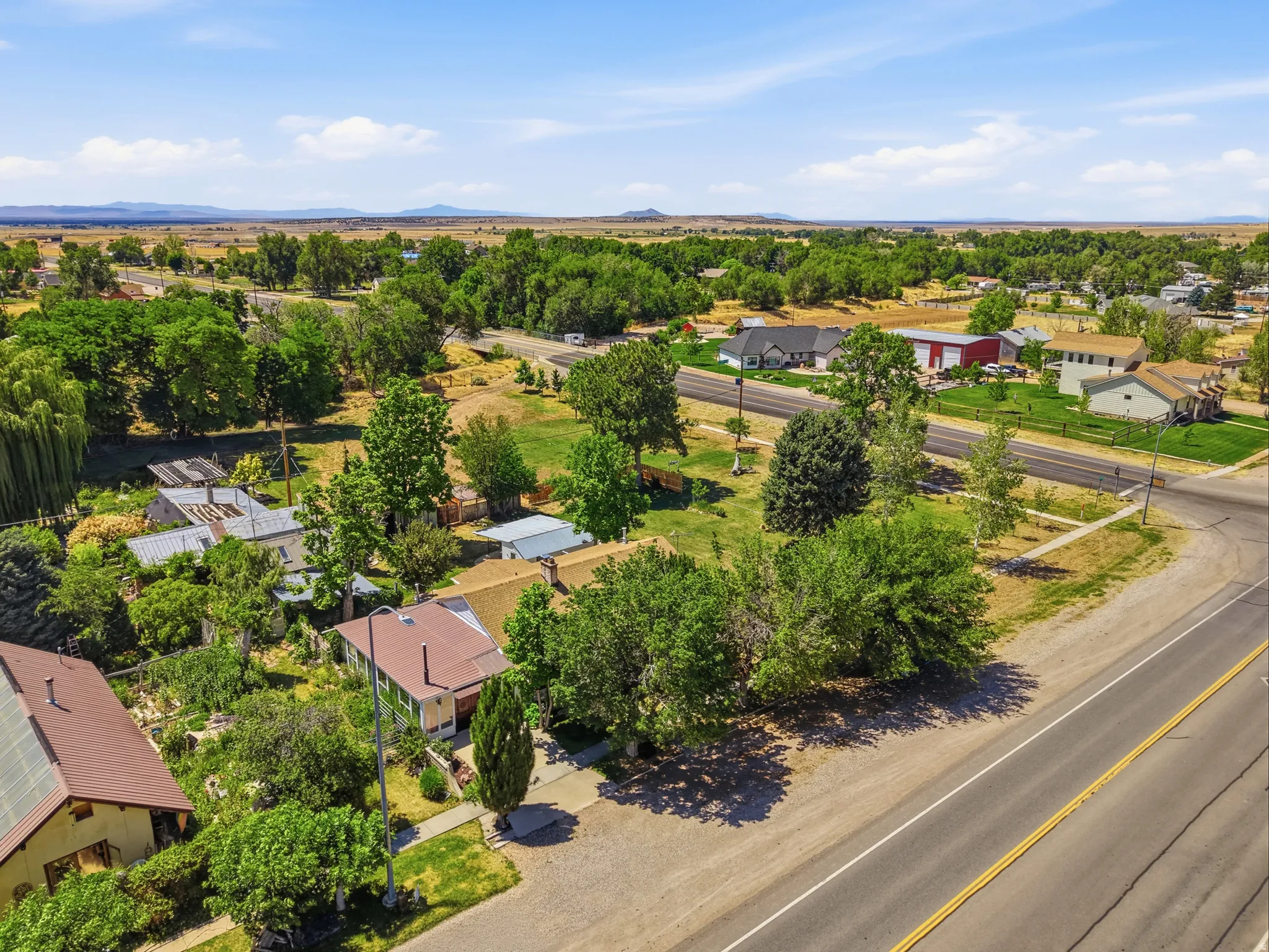 Aerial perspective showcasing a community with varied housing styles