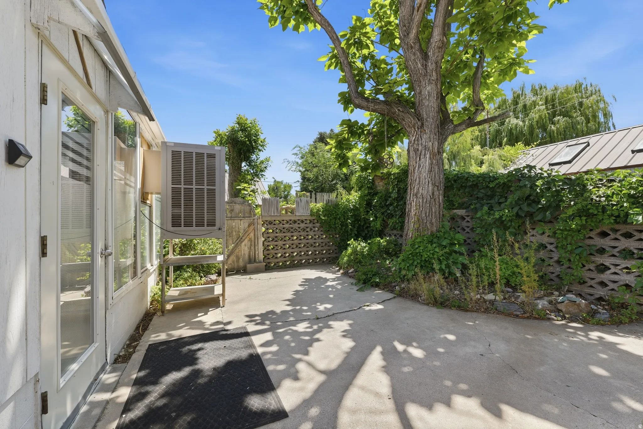 Concrete patio area featuring direct exterior access