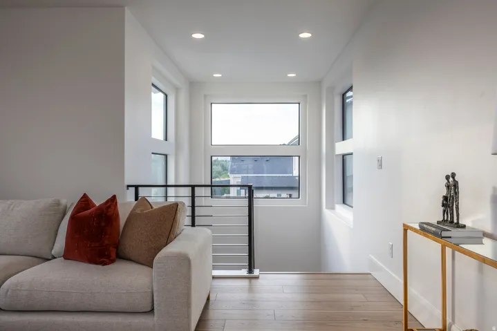 Hardwood-style flooring throughout the upper landing