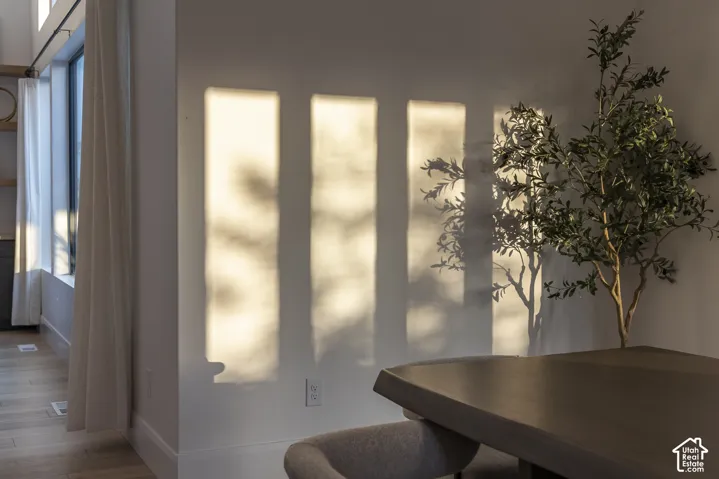 White wall with distinct window light patterns