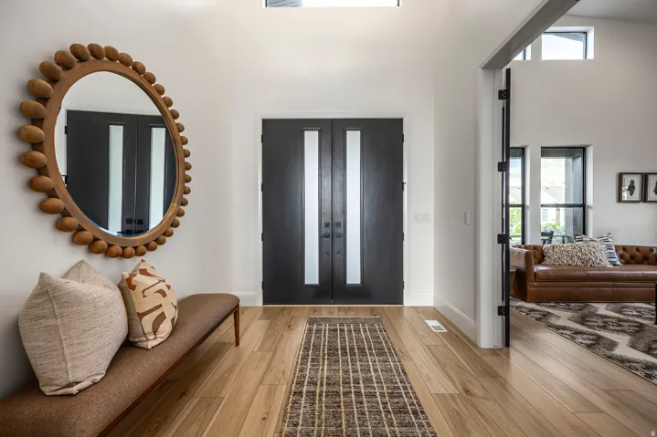 Double entry doors with vertical frosted glass panels