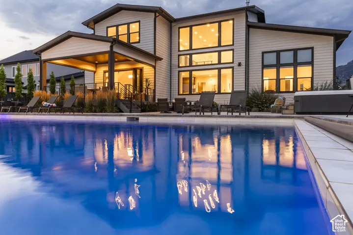 Modern two-story residence with a large swimming pool