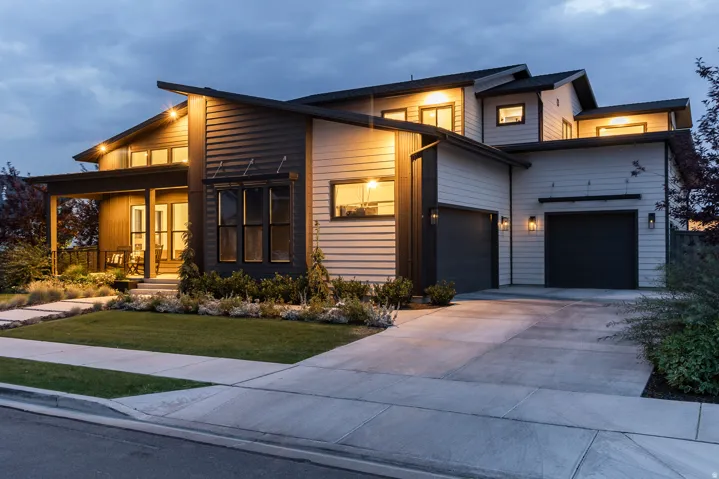Modern exterior featuring multi-level architecture and a covered front porch