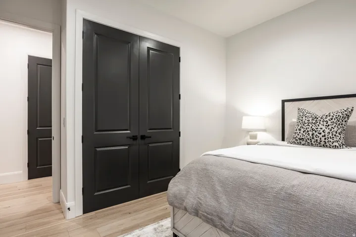 Dual panel-style doors with black hardware