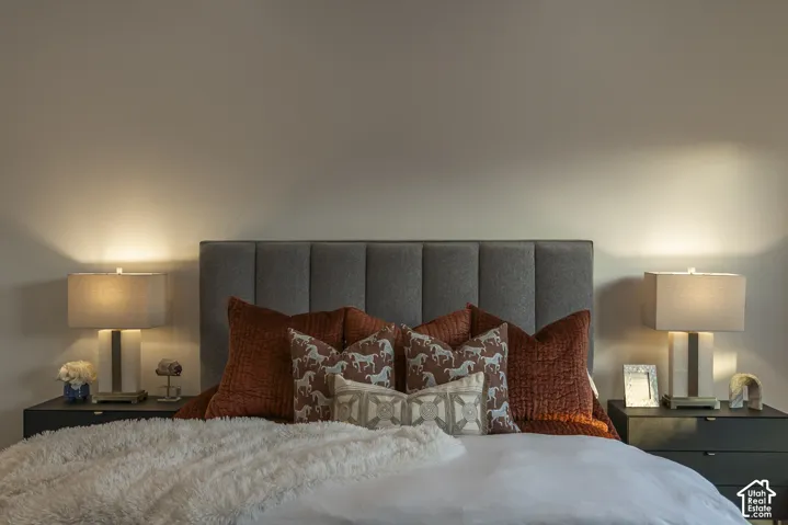 Upholstered headboard with vertical channel tufting
