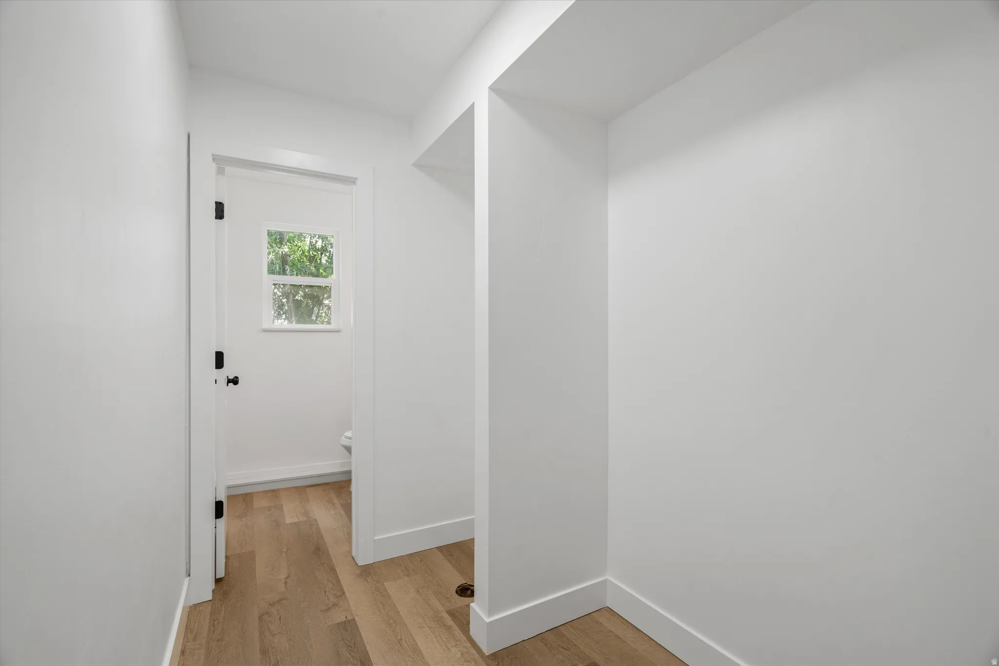 Mud room with half bathroom
