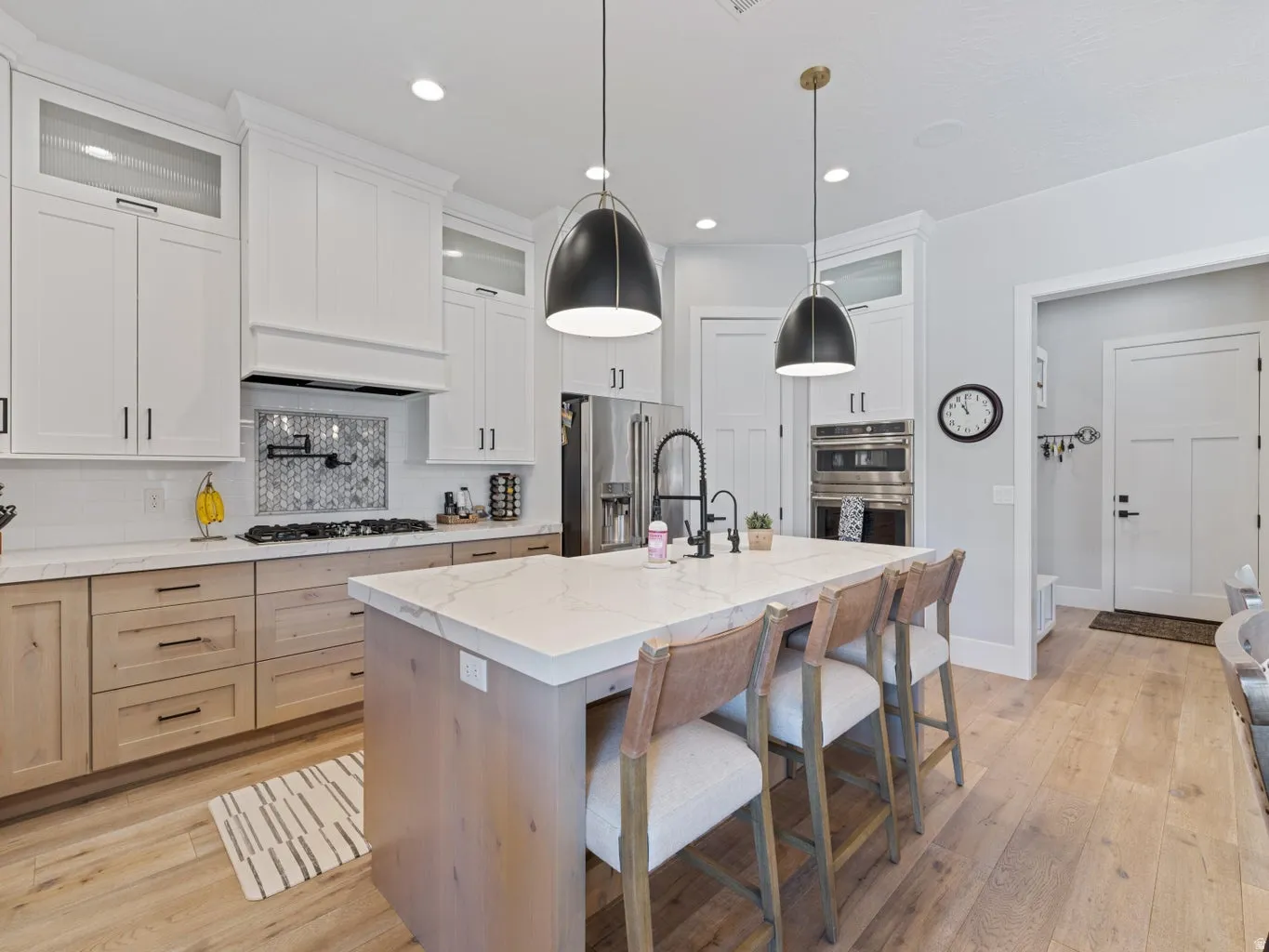 Central kitchen island featuring a light-toned countertop