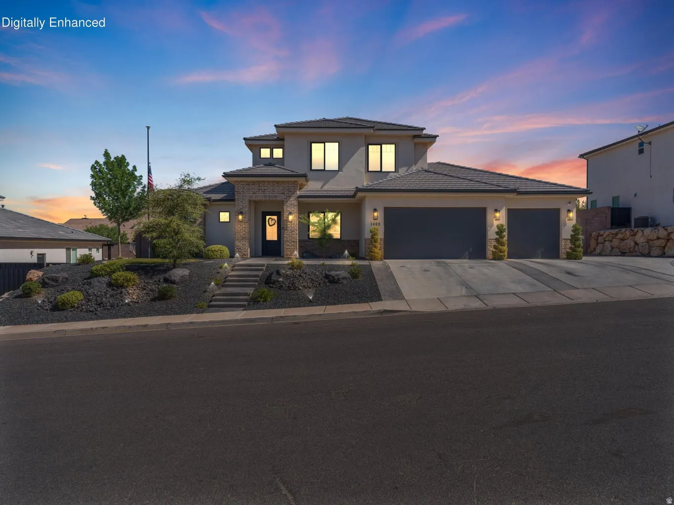 Contemporary two-story residence featuring a stone and stucco exterior