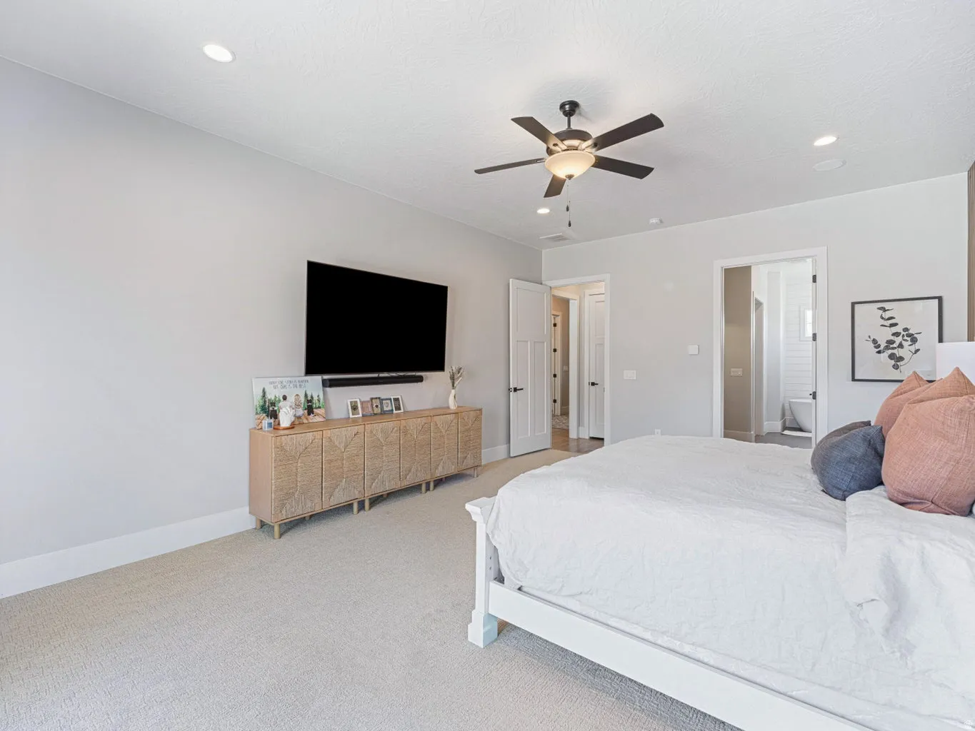 Recessed lighting, ceiling fan with light fixture, light gray wall tones, and plush carpeting