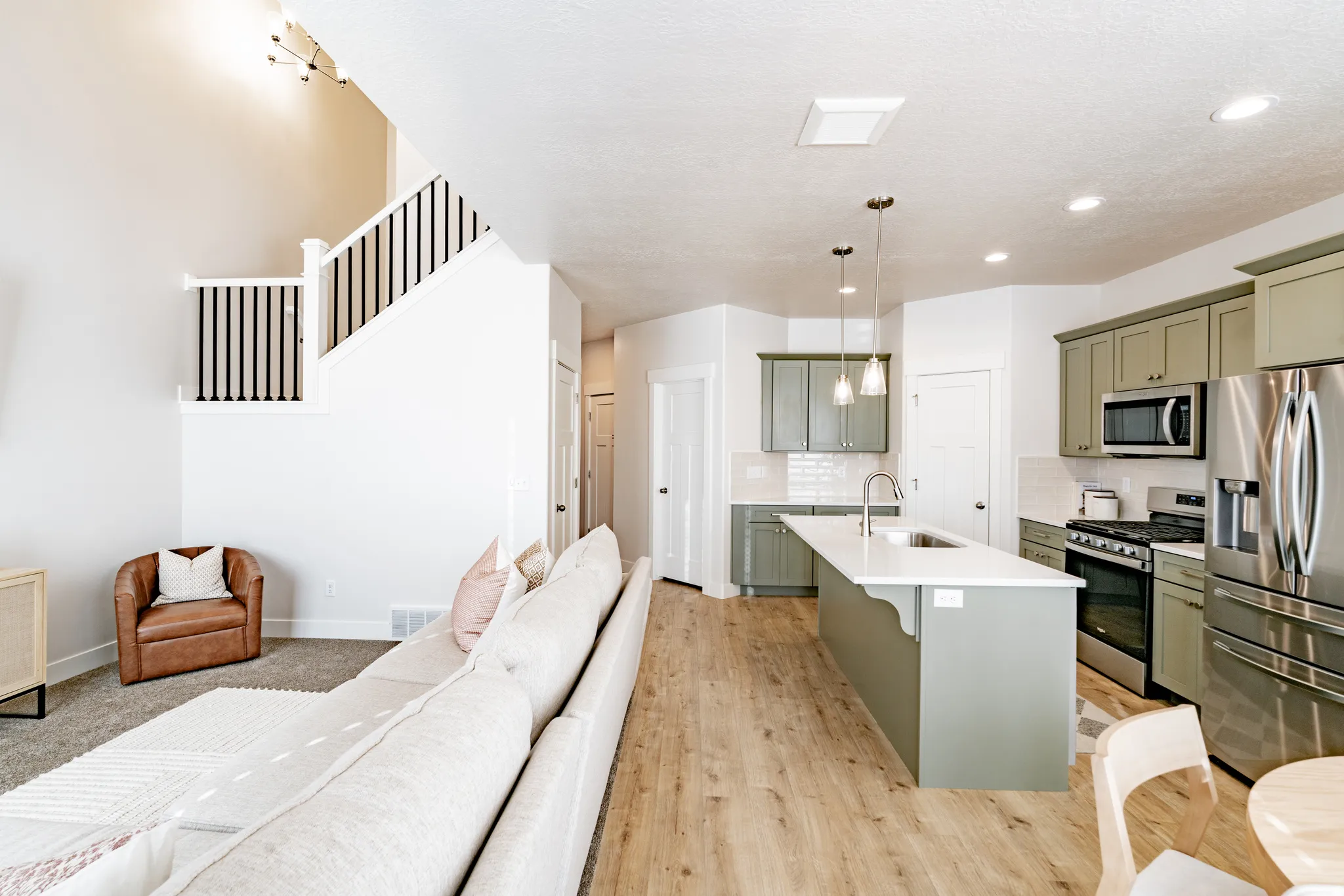 Open-concept kitchen and living area.