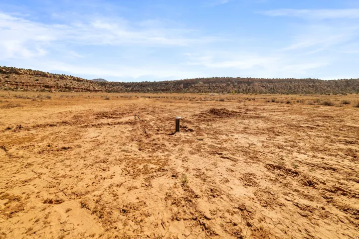 Expansive undeveloped land featuring a broad, flat terrain