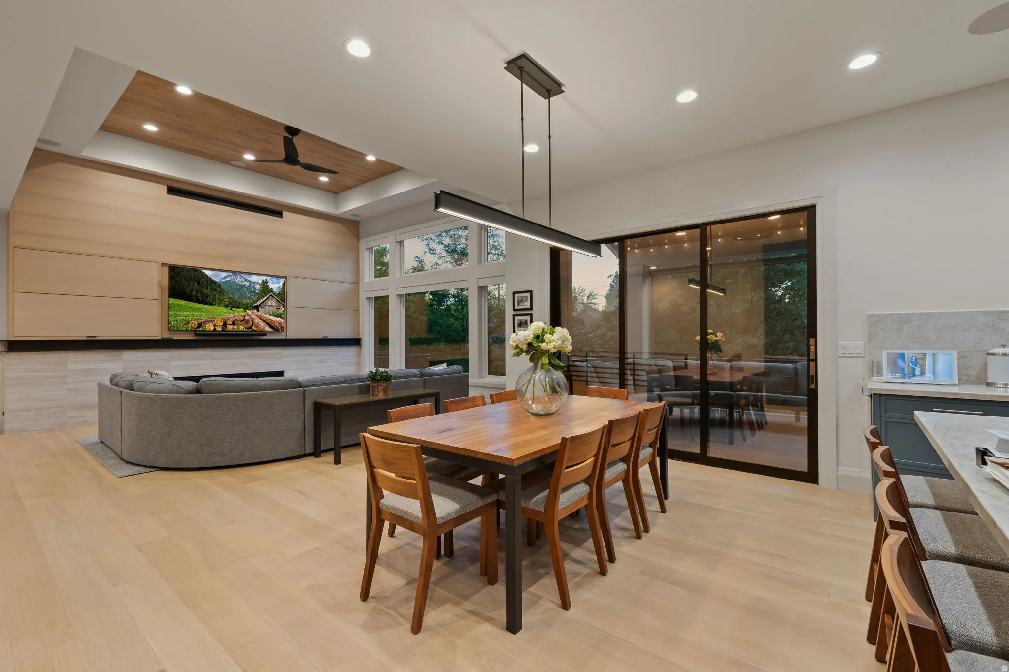 Open-concept living area featuring light wood-finish flooring throughout