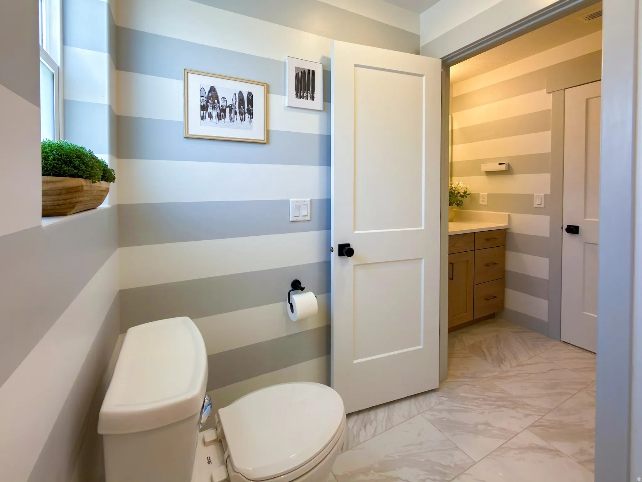 White and gray striped wall treatment