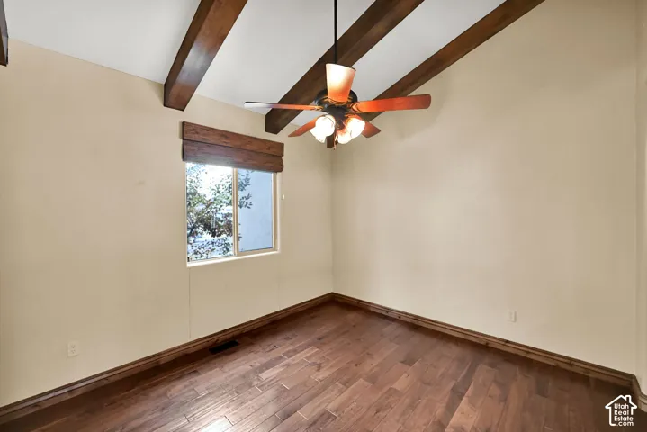 Vaulted ceiling with exposed wood beams