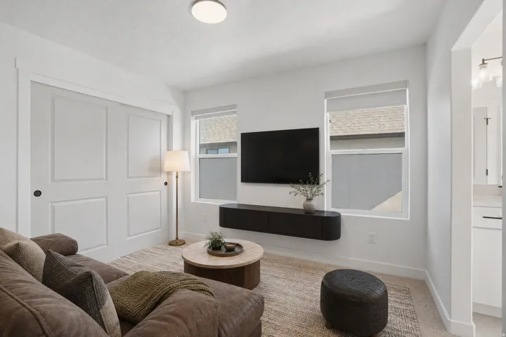 Bedroom currently utilized as sitting room