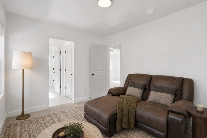 Bedroom currently utilized as sitting room