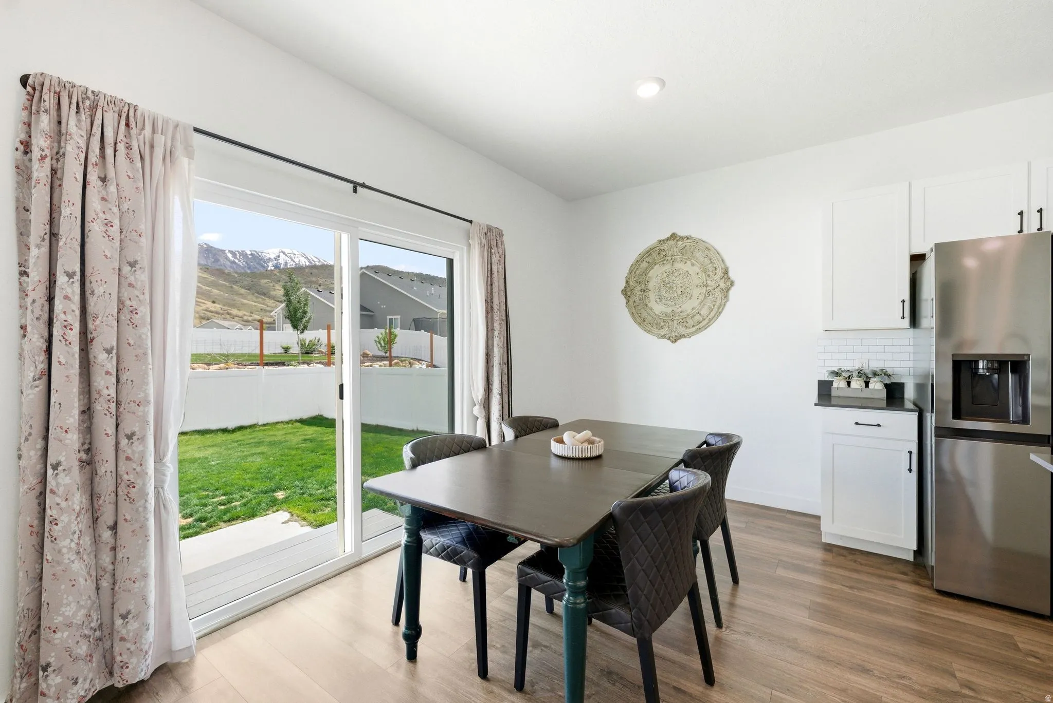 Extra wide/tall sliding glass doors to backyard and VIEWS!