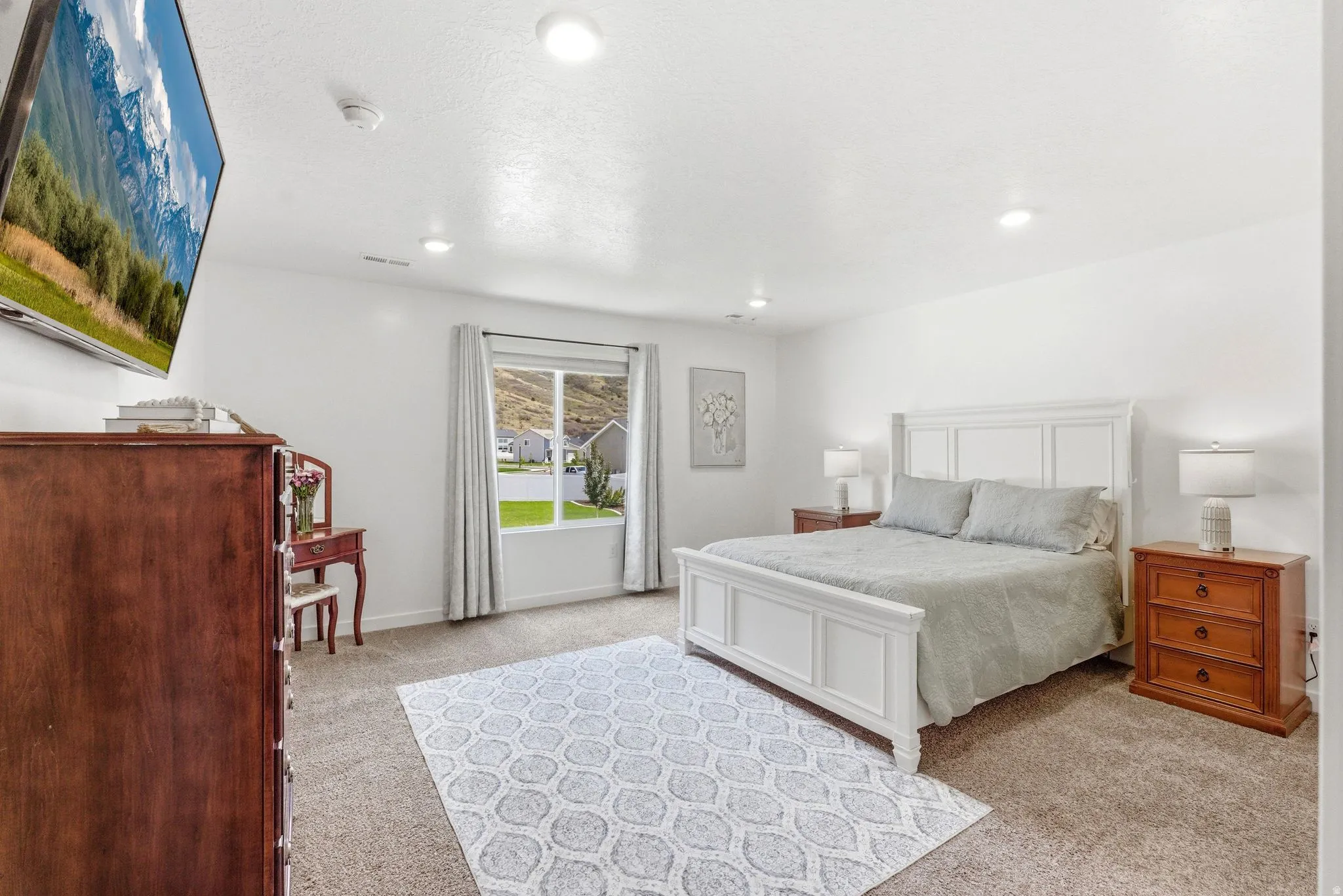Primary Bedroom features an ensuite bathroom & walk-in closet