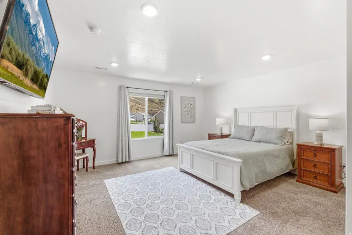 Primary Bedroom features an ensuite bathroom & walk-in closet
