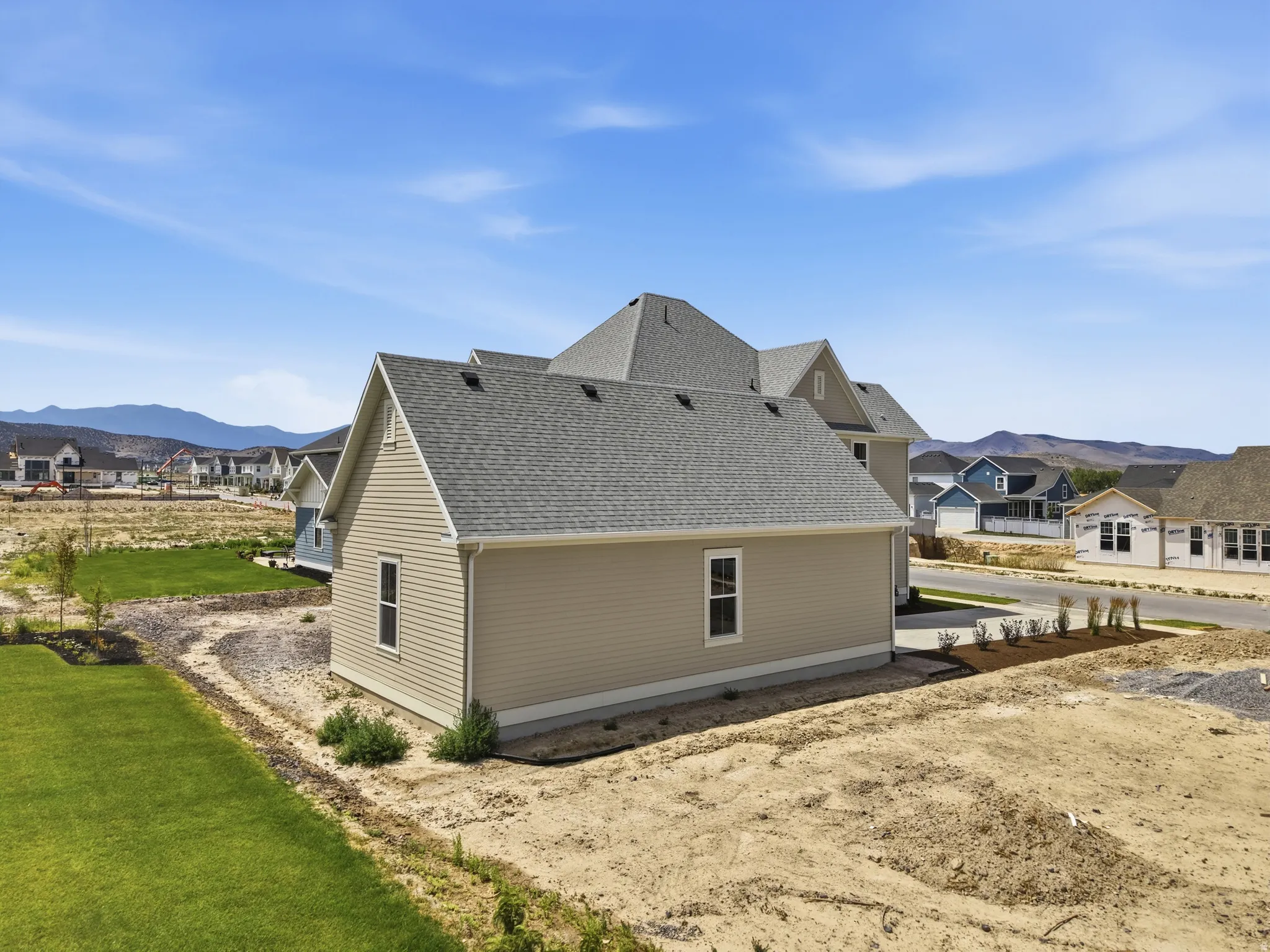 Gable-end architectural design with light beige siding