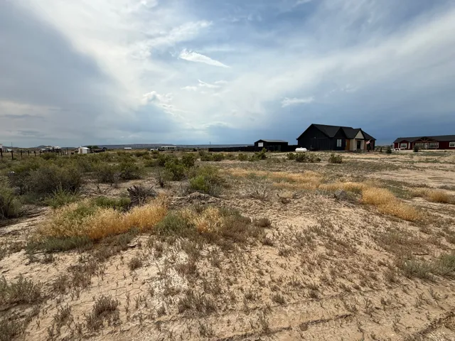 Expansive land parcel featuring natural desert vegetation
