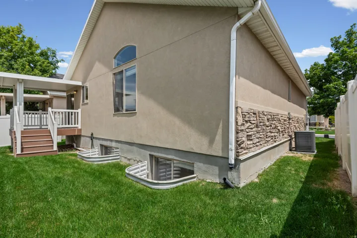Backyard featuring covered deck off kitchen and dining