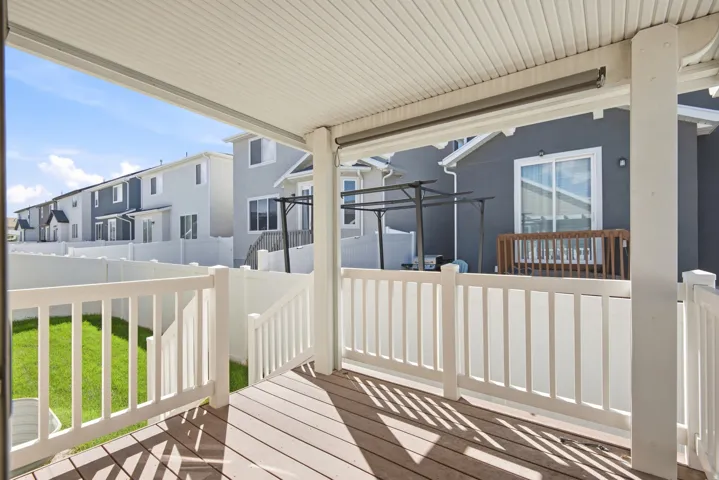 Backyard featuring covered deck off kitchen and dining