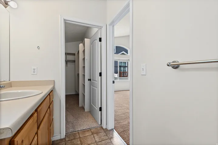 Primary bathroom and walk-in closet