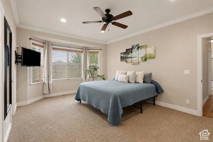 Room featuring a bay window, recessed lighting, and a ceiling fan