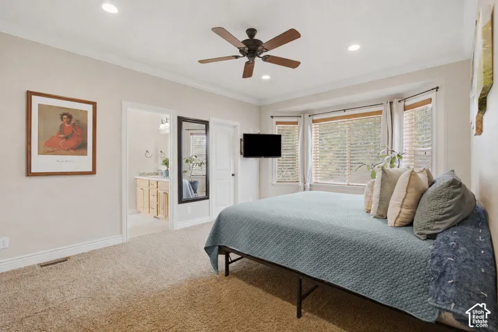 Bedroom featuring a bay window with blinds, recessed lighting, and a ceiling fan
