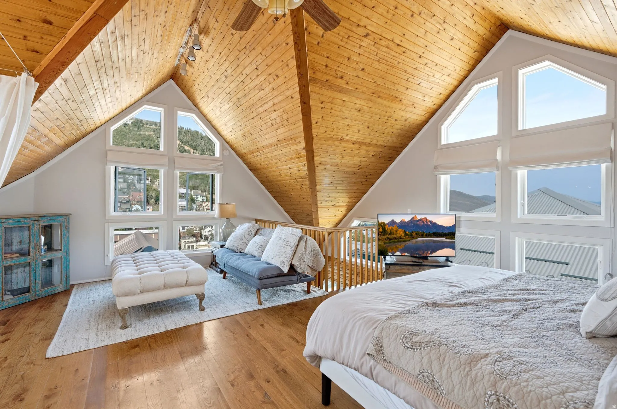 Vaulted wood-finish ceiling with exposed beams