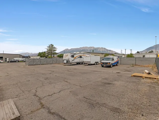 Expansive paved lot with chain link fencing