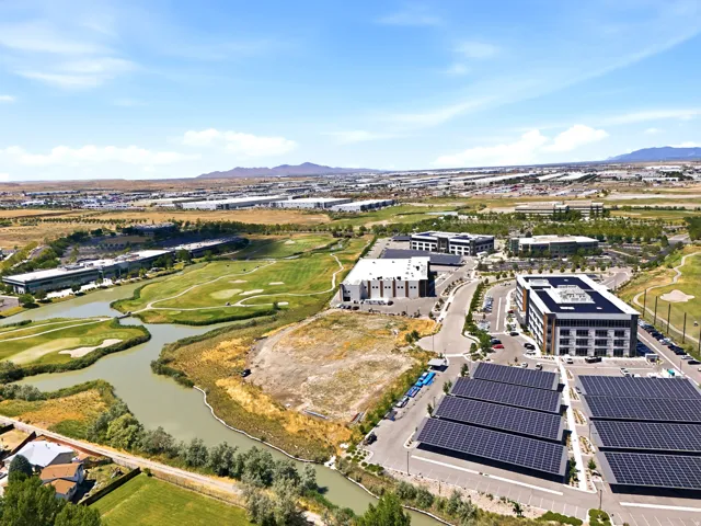 Expansive aerial perspective showcasing a developed commercial area with multiple office buildings