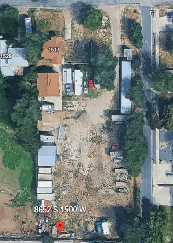 Satellite Imagery. Depicting the property at 8652 S 1500 W and surrounding parcels