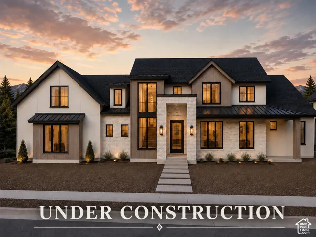 Modern farmhouse-style exterior featuring a striking blend of light brick, vertical white siding, and wood-finish accents